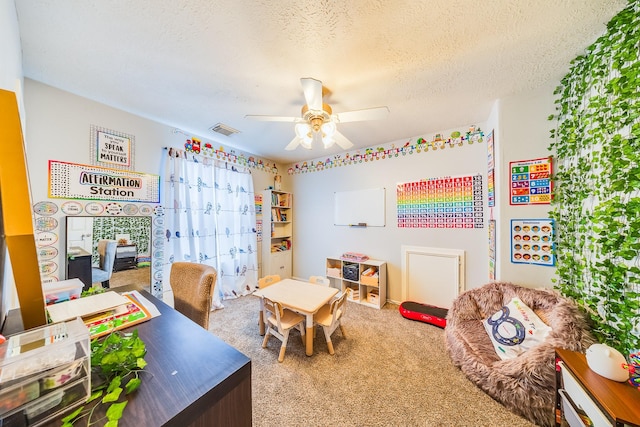 10627 Fire Sage Dr, Humble, TX 77396 - office featuring carpet, a ceiling fan, and a textured ceiling