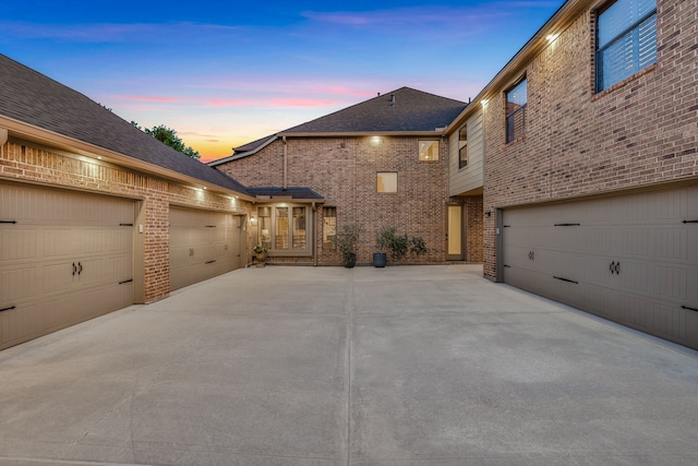 21311 Fairhaven Meadow Dr, Cypress, TX 77433 - view of front of property featuring brick siding, a garage, concrete driveway, and a shingled roof