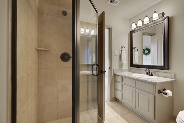 21311 Fairhaven Meadow Dr, Cypress, TX 77433 - bathroom with a shower stall, vanity, and tile patterned floors