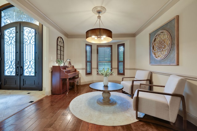 21311 Fairhaven Meadow Dr, Cypress, TX 77433 - entryway with wood-type flooring, french doors, ornamental molding, and a chandelier