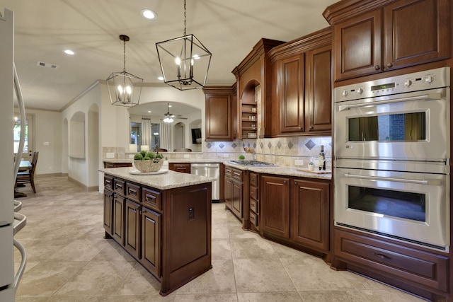 21311 Fairhaven Meadow Dr, Cypress, TX 77433 - kitchen featuring stainless steel appliances, a chandelier, open shelves, tasteful backsplash, and ornamental molding