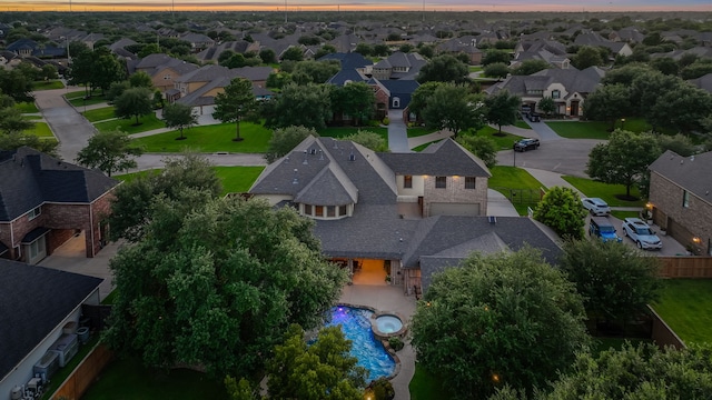 21311 Fairhaven Meadow Dr, Cypress, TX 77433 - aerial view at dusk of a residential view and view of pool area