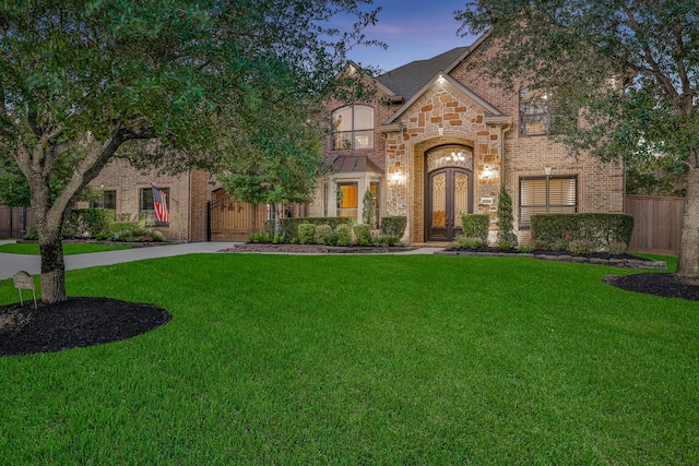 21311 Fairhaven Meadow Dr, Cypress, TX 77433 - view of front of house with concrete driveway, brick siding, and stone siding