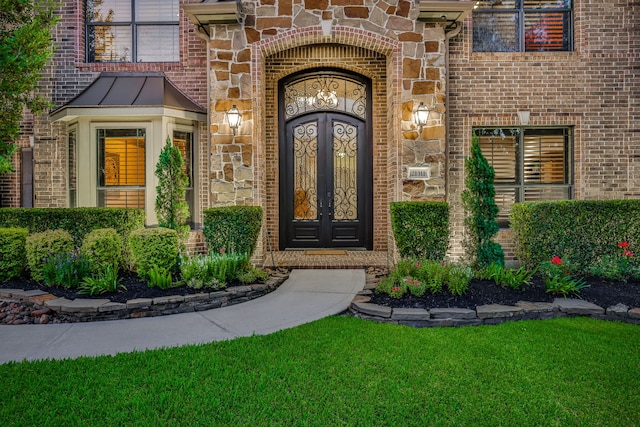 21311 Fairhaven Meadow Dr, Cypress, TX 77433 - property entrance featuring brick siding, a yard, and stone siding