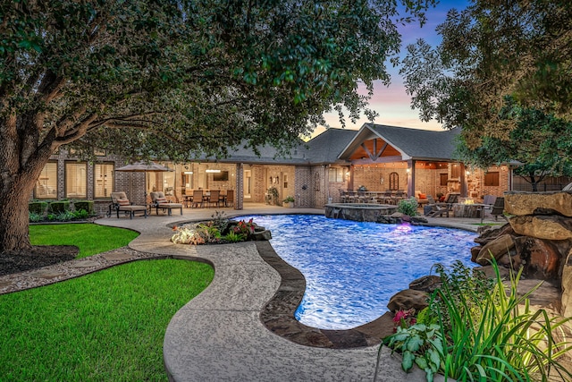21311 Fairhaven Meadow Dr, Cypress, TX 77433 - pool at dusk with a patio and a pool with connected hot tub