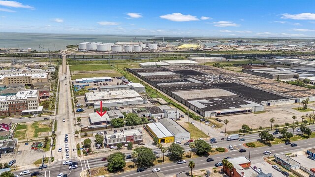 902 51st St, Galveston, TX 77551 - aerial view of property and surrounding area with a nearby body of water