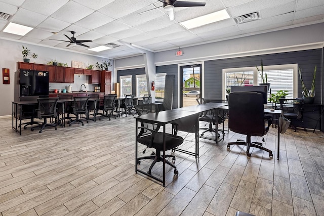 902 51st St, Galveston, TX 77551 - office with ceiling fan, a drop ceiling, and light wood-type flooring