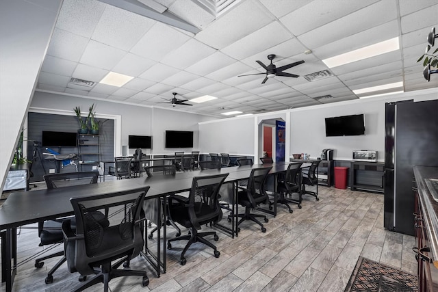 902 51st St, Galveston, TX 77551 - office space with light wood-type flooring, a drop ceiling, and ceiling fan