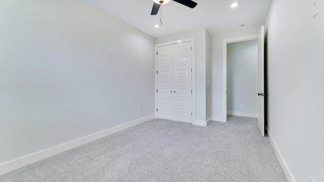 6902 Apollo St, Houston, TX 77091 - unfurnished bedroom with light colored carpet, recessed lighting, ceiling fan, and a closet