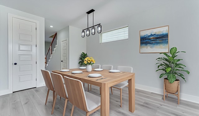 6902 Apollo St, Houston, TX 77091 - dining space featuring light wood-type flooring, stairway, and recessed lighting