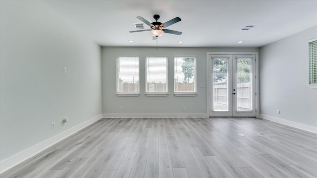 6902 Apollo St, Houston, TX 77091 - spare room featuring a ceiling fan, light wood-type flooring, french doors, and recessed lighting