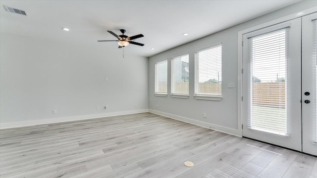 6902 Apollo St, Houston, TX 77091 - empty room with ceiling fan, light wood-style flooring, and recessed lighting