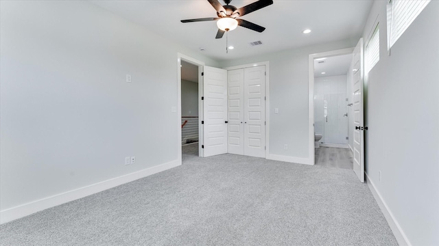 6902 Apollo St, Houston, TX 77091 - unfurnished bedroom with light carpet, recessed lighting, ensuite bathroom, a ceiling fan, and a closet