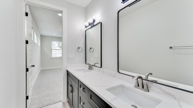 6902 Apollo St, Houston, TX 77091 - full bath with double vanity and recessed lighting