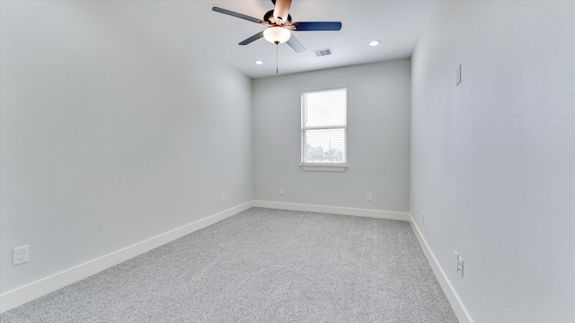 6902 Apollo St, Houston, TX 77091 - empty room with a ceiling fan, light colored carpet, and recessed lighting