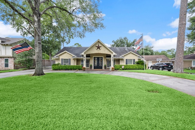 13306 Boca Raton Dr, Houston, TX 77069 - view of front facade featuring french doors and curved driveway