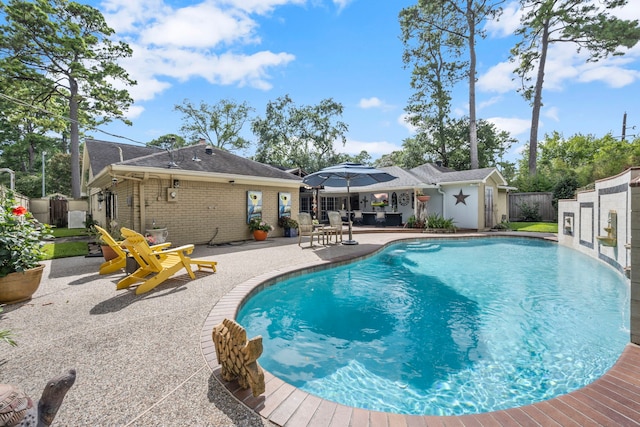13306 Boca Raton Dr, Houston, TX 77069 - view of swimming pool featuring a patio area and an outdoor structure