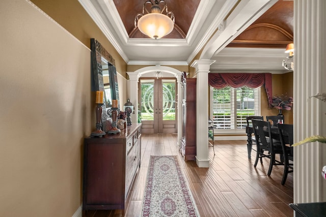 13306 Boca Raton Dr, Houston, TX 77069 - entryway with ornate columns, french doors, ornamental molding, wood finished floors, and a chandelier