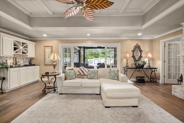 13306 Boca Raton Dr, Houston, TX 77069 - living room featuring dark wood-type flooring, ornamental molding, a ceiling fan, bar with sink, and recessed lighting