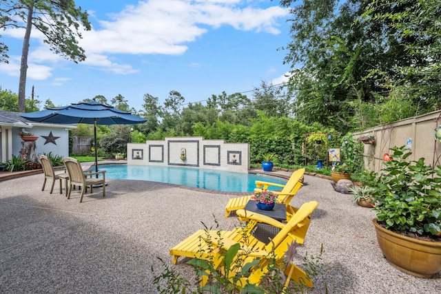 13306 Boca Raton Dr, Houston, TX 77069 - view of swimming pool with a patio, a fenced backyard, and an outbuilding