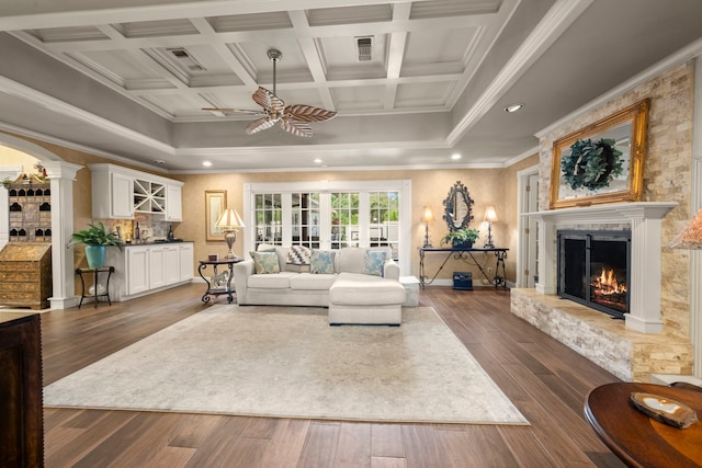 13306 Boca Raton Dr, Houston, TX 77069 - living area featuring ceiling fan, a glass covered fireplace, dark wood-type flooring, ornamental molding, and recessed lighting
