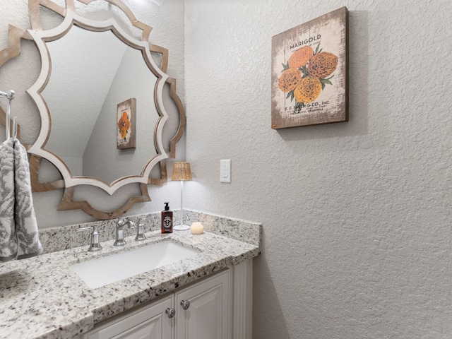 103 Lakeshore Ct, Clute, TX 77531 - bathroom with vanity and a textured wall