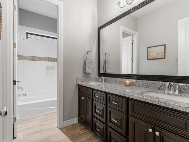 103 Lakeshore Ct, Clute, TX 77531 - bathroom with double vanity, wood finished floors, and bathtub / shower combination