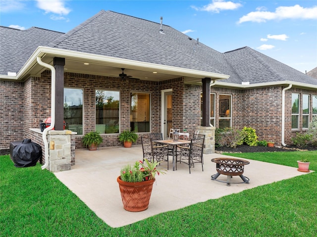103 Lakeshore Ct, Clute, TX 77531 - view of patio featuring a ceiling fan and a fire pit