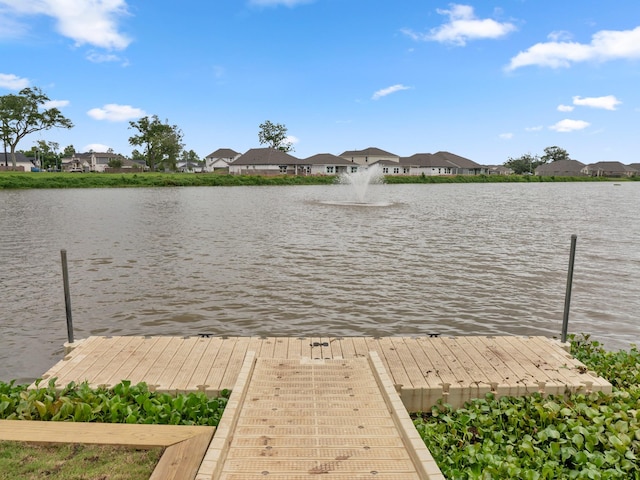 103 Lakeshore Ct, Clute, TX 77531 - dock featuring a water view and a residential view