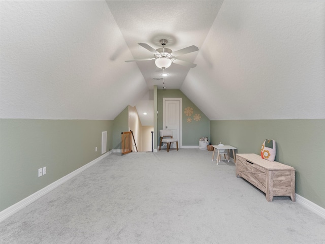 103 Lakeshore Ct, Clute, TX 77531 - bonus room featuring light carpet, vaulted ceiling, ceiling fan, and a textured ceiling