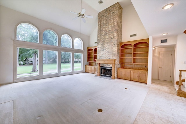 3134 Lake Island Dr, Montgomery, TX 77356 - unfurnished living room with high vaulted ceiling, a ceiling fan, a large fireplace, and light carpet