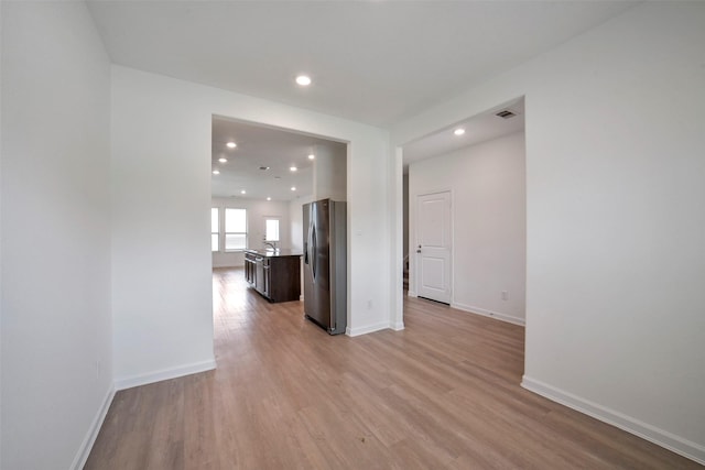 4918 Eldorado Rose Pl, Katy, TX 77493 - unfurnished room with light wood-style flooring and recessed lighting
