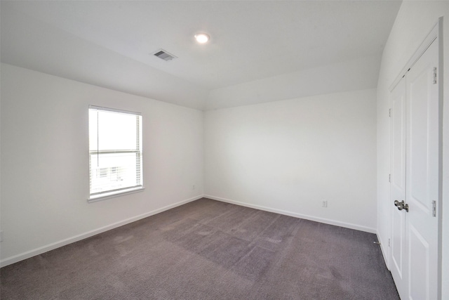 4918 Eldorado Rose Pl, Katy, TX 77493 - unfurnished bedroom featuring dark colored carpet, vaulted ceiling, and a closet