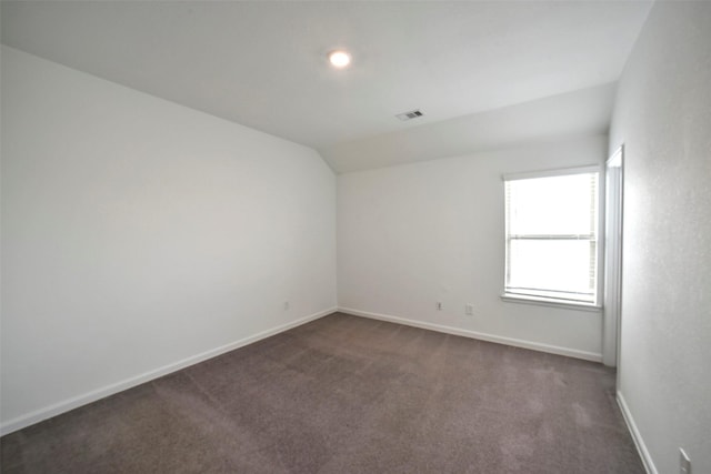 4918 Eldorado Rose Pl, Katy, TX 77493 - unfurnished room featuring vaulted ceiling and dark carpet