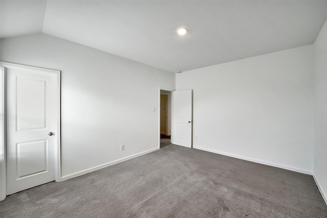 4918 Eldorado Rose Pl, Katy, TX 77493 - unfurnished bedroom featuring carpet floors and vaulted ceiling