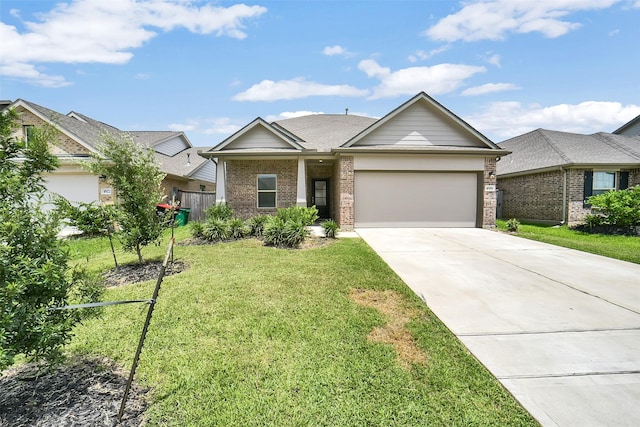 4918 Eldorado Rose Pl, Katy, TX 77493 - view of front facade featuring brick siding, driveway, and a garage
