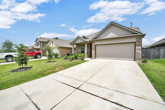 4918 Eldorado Rose Pl, Katy, TX 77493 - view of front of house featuring brick siding, a garage, and driveway
