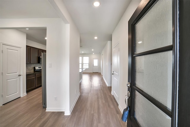 4918 Eldorado Rose Pl, Katy, TX 77493 - hallway with wood finished floors and recessed lighting
