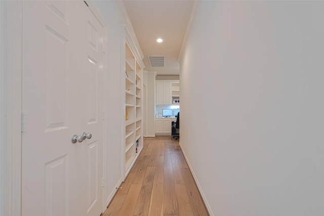 14439 Basalt Ln, Houston, TX 77077 - corridor featuring light wood-type flooring, recessed lighting, and crown molding
