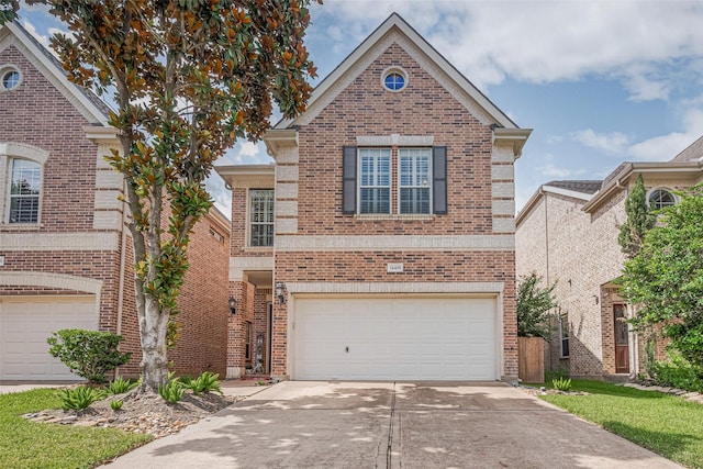 14439 Basalt Ln, Houston, TX 77077 - traditional-style house featuring concrete driveway, brick siding, and a garage