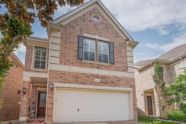 14439 Basalt Ln, Houston, TX 77077 - traditional-style home featuring brick siding, an attached garage, and driveway