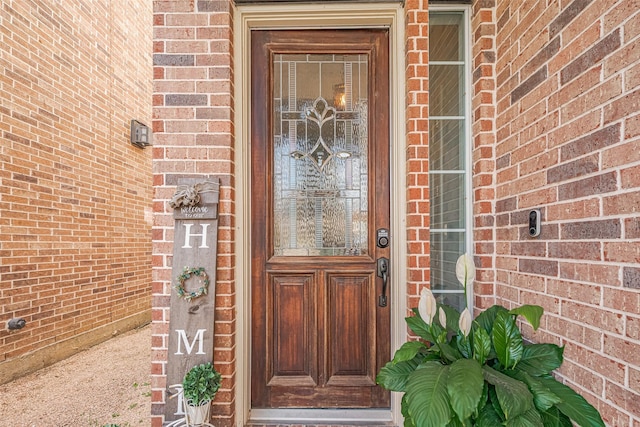 14439 Basalt Ln, Houston, TX 77077 - doorway to property featuring brick siding