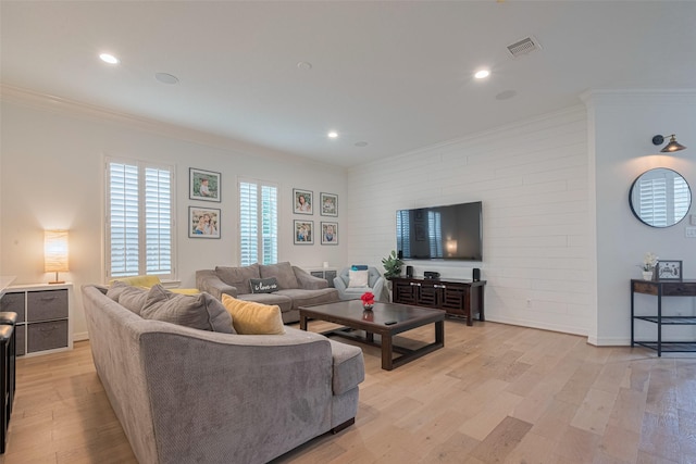 14439 Basalt Ln, Houston, TX 77077 - living area featuring ornamental molding, light wood finished floors, and recessed lighting