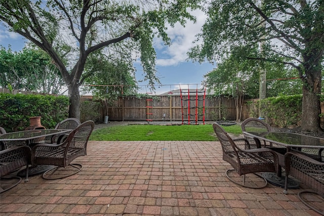 14439 Basalt Ln, Houston, TX 77077 - fenced backyard with outdoor dining area and a patio area