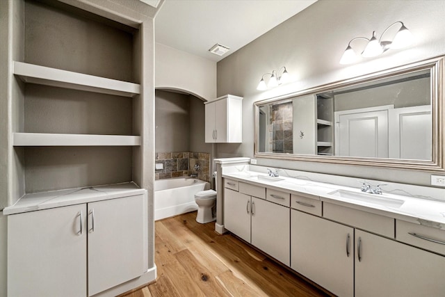 1901 Post Oak Blvd Unit 1206, Houston, TX 77056 - full bathroom featuring double vanity, wood finished floors, and a bath