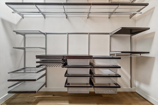 1901 Post Oak Blvd Unit 1206, Houston, TX 77056 - detailed view of baseboards and wood finished floors