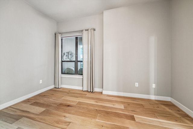 1901 Post Oak Blvd Unit 1206, Houston, TX 77056 - empty room featuring light wood finished floors and baseboards