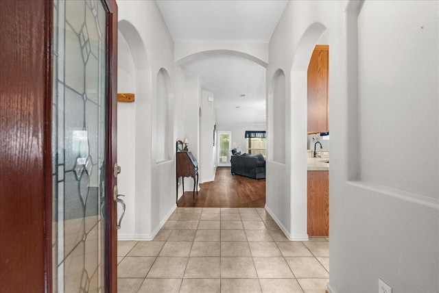 1803 Winding Trail Ln, Alvin, TX 77511 - entrance foyer featuring light tile patterned flooring and arched walkways