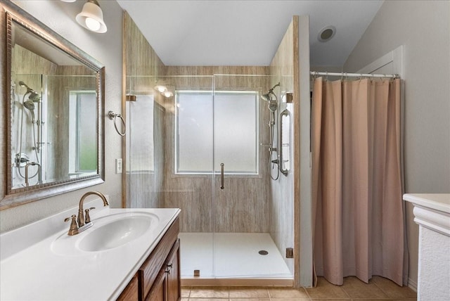 1803 Winding Trail Ln, Alvin, TX 77511 - full bathroom featuring a stall shower, vanity, tile patterned flooring, and vaulted ceiling