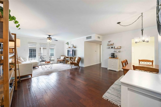 2230 S Piney Point Rd Unit 206, Houston, TX 77063 - living area with wood finished floors, crown molding, ceiling fan, and a chandelier